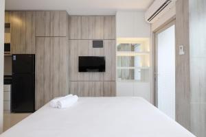 Stunning Studio at Ciputra World 2 Apartment By Travelio