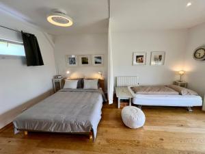 Maisons de vacances Nid d'amour en Auvergne avec piscine : photos des chambres