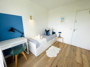 Appartements Le FRIENDLY, proche PARIS : photos des chambres