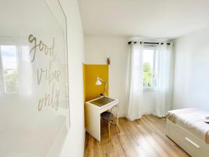 Appartements Le FRIENDLY, proche PARIS : photos des chambres