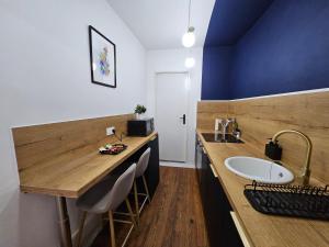 Appartements Suite chic, contemporaine au pied de la Cathedrale : photos des chambres