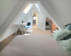 Appartements Duplex en centre-ville : photos des chambres