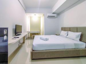 Elegant and Comfy Studio Barsa City Apartment By Travelio