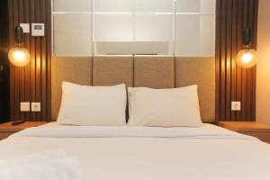 Stunning and Comfy 2BR + Study Room at Sudirman Suites Apartment By Travelio