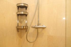 Stunning and Comfy 2BR + Study Room at Sudirman Suites Apartment By Travelio