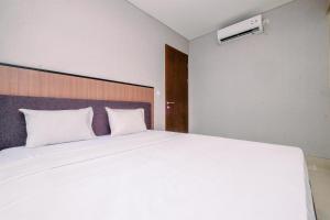 Nice and Strategic 1BR at Ciputra World 2 Apartment By Travelio