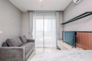 Nice and Strategic 1BR at Ciputra World 2 Apartment By Travelio