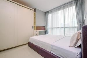 Nice and Strategic 1BR at Ciputra World 2 Apartment By Travelio