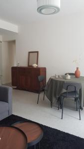 Appartements La Maison, Studio avec parc arbore, local velo moto : photos des chambres