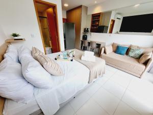 Flat em Muro Alto - Porto de Galinhas - MAKIA D209 - By Anfitrião Legal