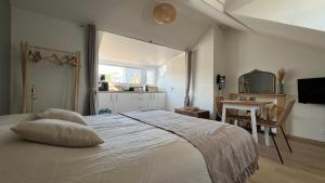 Appartements Studio Le nid de pie : photos des chambres