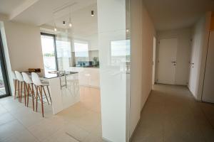 Huswell - Beautiful apartment with communal pool and gym