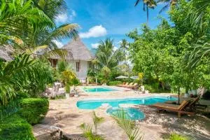 Tamu Tamu Boutique Hotel - 普瓦尼梅查恩加尼