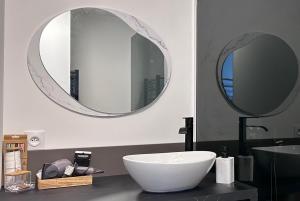 Appartements Pura Vida Spa - gite avec spa exterieur couvert : photos des chambres