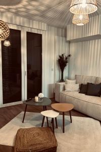 Appartements Pura Vida Spa - gite avec spa exterieur couvert : photos des chambres
