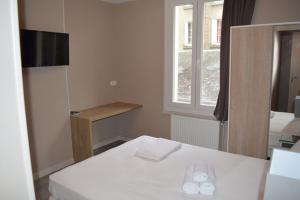 Appartements Appart'hotel Voltaire : photos des chambres