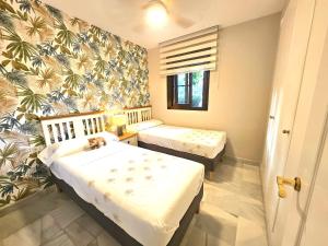 Modern 2BR APT second line Marbella Beach, Pools and Paddle