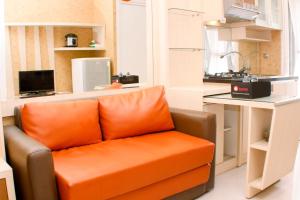 Nice and Strategic 2BR at Green Pramuka City Apartment By Travelio