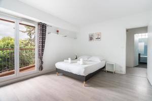 Appartements Le Blanqui - Face RER B Free Parking : photos des chambres