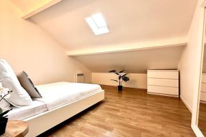 Maisons de vacances Duplex avec Jacuzzi proche Paris et Roissy CDG : photos des chambres