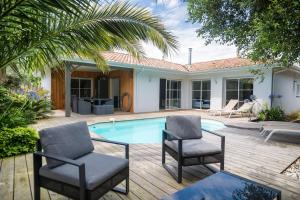 Villas Villa proche du bassin -piscine : photos des chambres