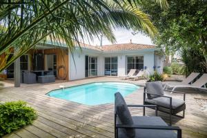 Villas Villa proche du bassin -piscine : photos des chambres