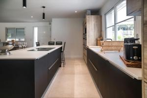 Villas Villa proche du bassin -piscine : photos des chambres