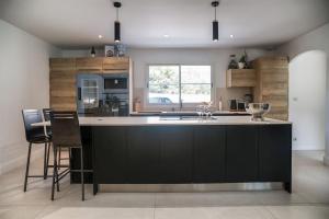 Villas Villa proche du bassin -piscine : photos des chambres