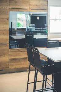 Villas Villa proche du bassin -piscine : photos des chambres