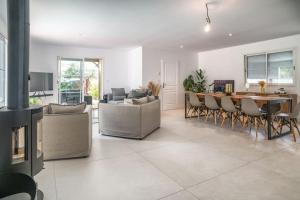 Villas Villa proche du bassin -piscine : photos des chambres