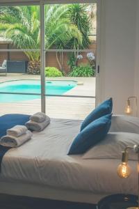Villas Villa proche du bassin -piscine : photos des chambres