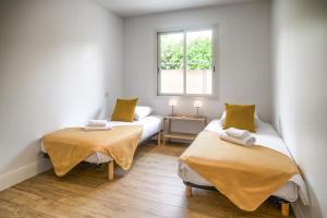 Villas Villa proche du bassin -piscine : photos des chambres