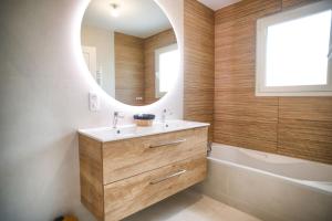 Villas Villa proche du bassin -piscine : photos des chambres