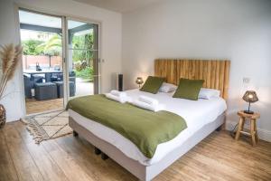 Villas Villa proche du bassin -piscine : photos des chambres