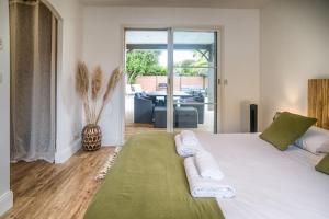 Villas Villa proche du bassin -piscine : photos des chambres