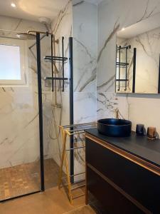 Villas Villa proche du bassin -piscine : photos des chambres