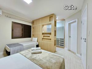 No Centro 9 pessoas com Piscina e Churrasqueira