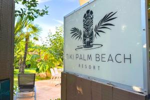 Maisons de vacances Studio avec piscine et jacuzzi - Tiki Palm Beach Resort : photos des chambres