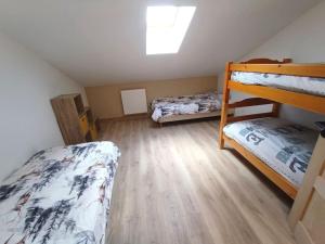 Appartements Grand appartement neuf au calme : photos des chambres