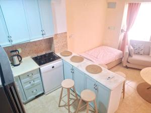 Detached Greek house in the hearth of Cesme Bazaar