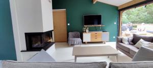 Maisons de vacances Tres belle maison en bois,dans la Marina, 10pers, au bord de leau : photos des chambres
