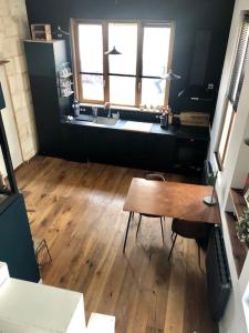 Appartements Studio-Loft lumineux et calme : photos des chambres