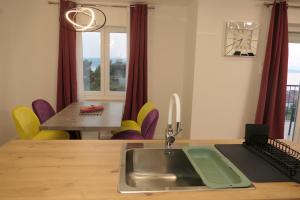 Apartmani Bura 