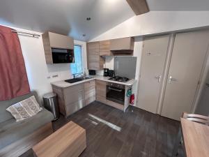 Campings Mobil Home 2 chambres, 4 a 6 personnes, Vias Plage, Camping La Carabasse - 4 etoiles : photos des chambres