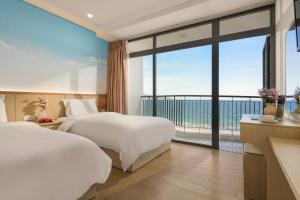 Phòng Deluxe 2 giường - Hướng biển (Deluxe Twin Room - Ocean view)