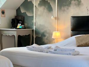 Hotels Le Cheval Blanc : photos des chambres