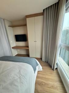 Sensacional Flat Serra Class - vista do Pôr do Sol