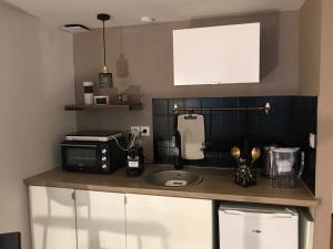 Appartements Studio cosy : photos des chambres