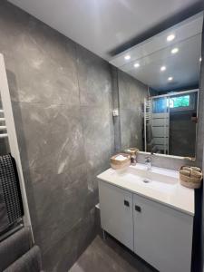 Appartements Le cocon du rez de jardin : photos des chambres