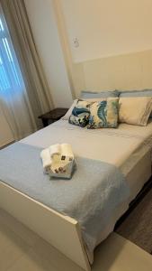 Apartamento vista do mar, pé na areia e águas tranquilas, no cento de Guarapari